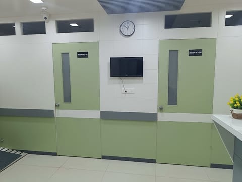 Inpatient room corridor showing Room 01 and Room 02 at Osteon Orthopedic Hospital