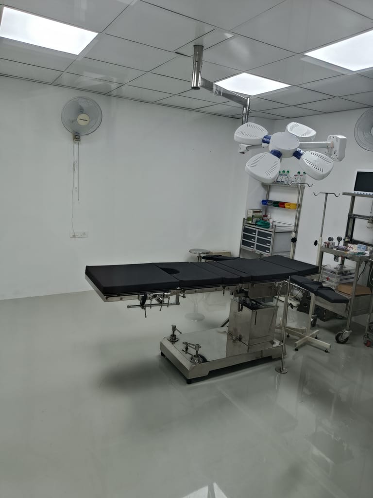 Operating theatre at Osteon Orthopedic Hospital equipped with surgical table and overhead LED lights, Pimple Saudagar
