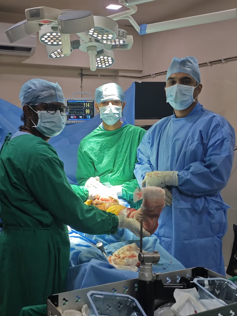 Dr. Harshal V Kalambe Patil and team performing orthopedic surgery in operating theatre at Osteon Orthopedic Hospital